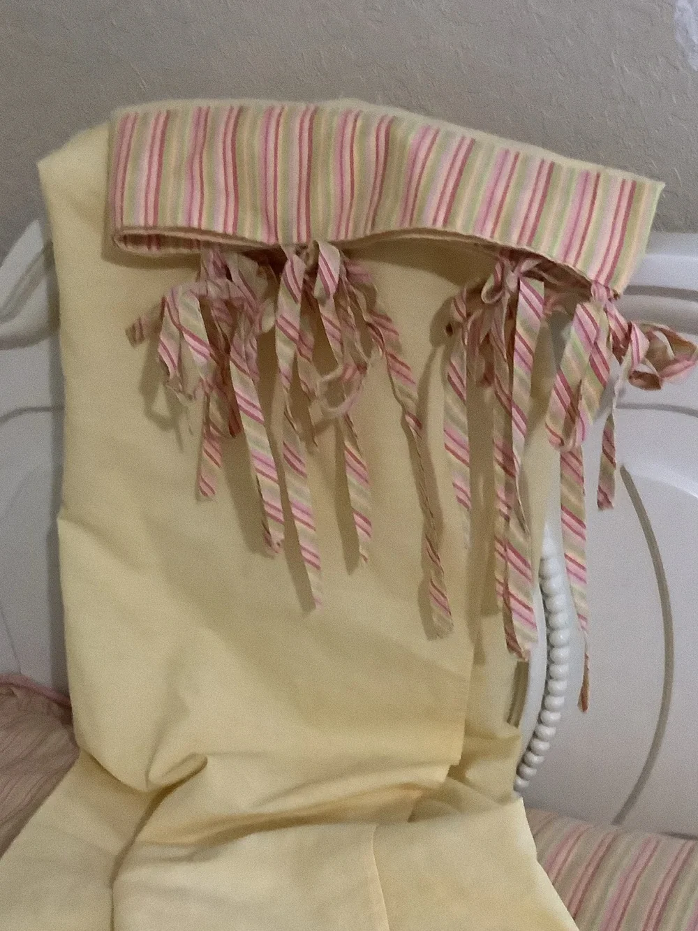 Cream Floral Embroidered Quilt with Peach Accents